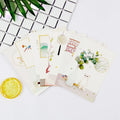Pack of nine Japanese-style minimalist cartoon postcards with Paris and historic site designs.