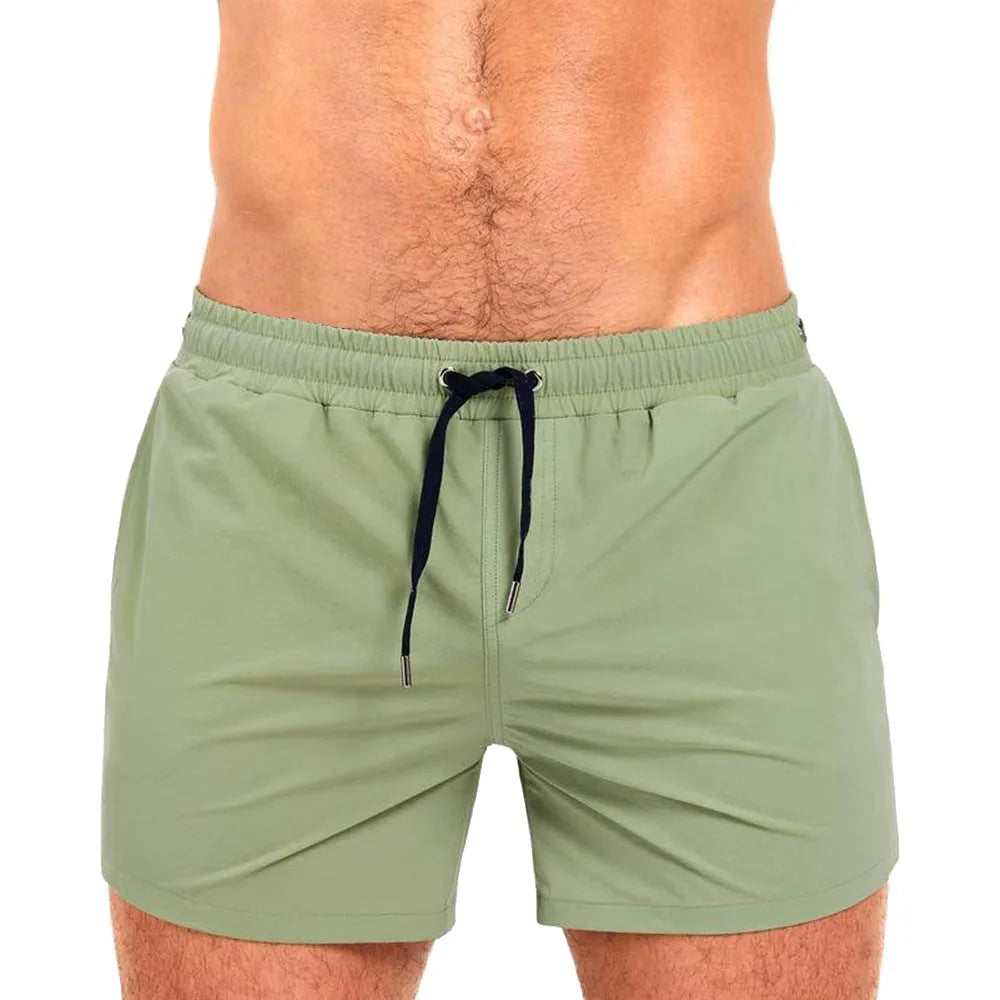 Mesh-lined sports shorts in polyester fabric showing colour options