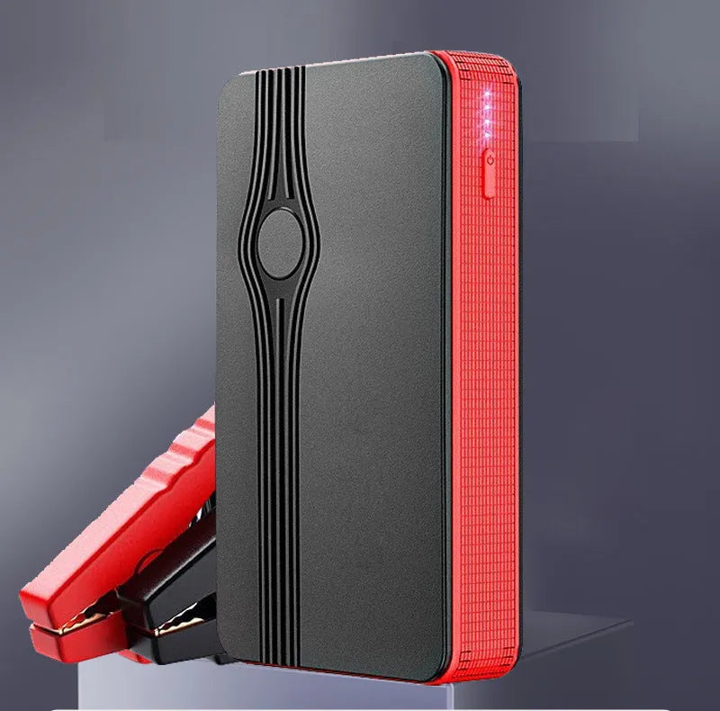 Red K4-E automobile emergency starting power supply and jump starter with USB cable.