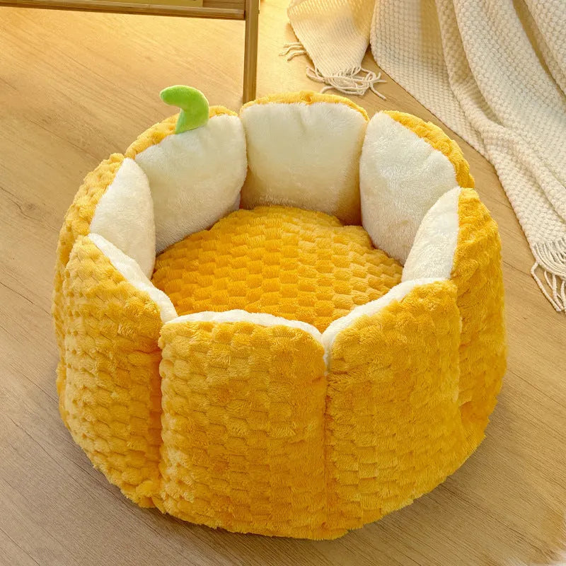 Pumpkin-shaped pet bed with raised sides and cotton filling for cats and small dogs