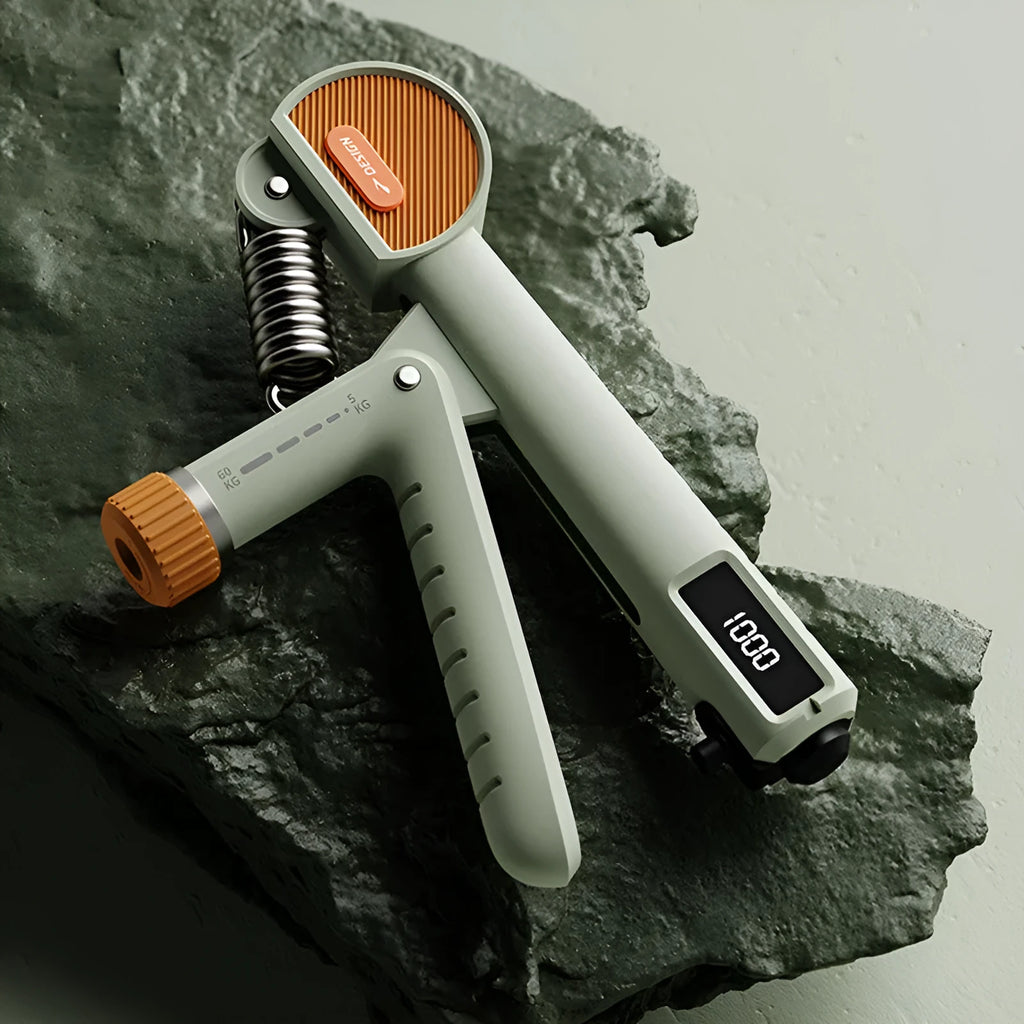 Adjustable spring grip strength trainer in ivory white, black, or green.