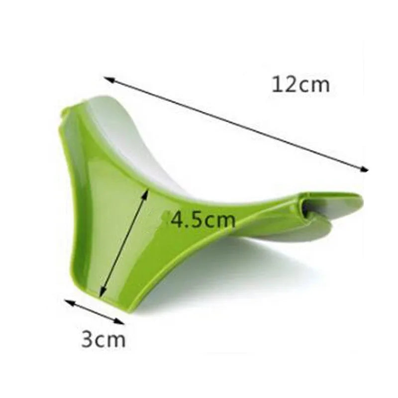 Green silicone kitchen funnel with clamp for round pots on kitchen counter