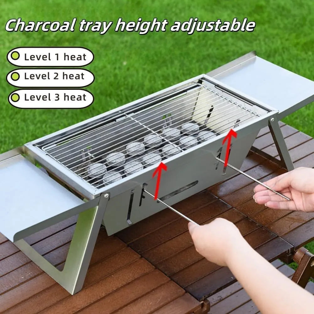 Small foldable steel charcoal grill for portable outdoor barbecues.