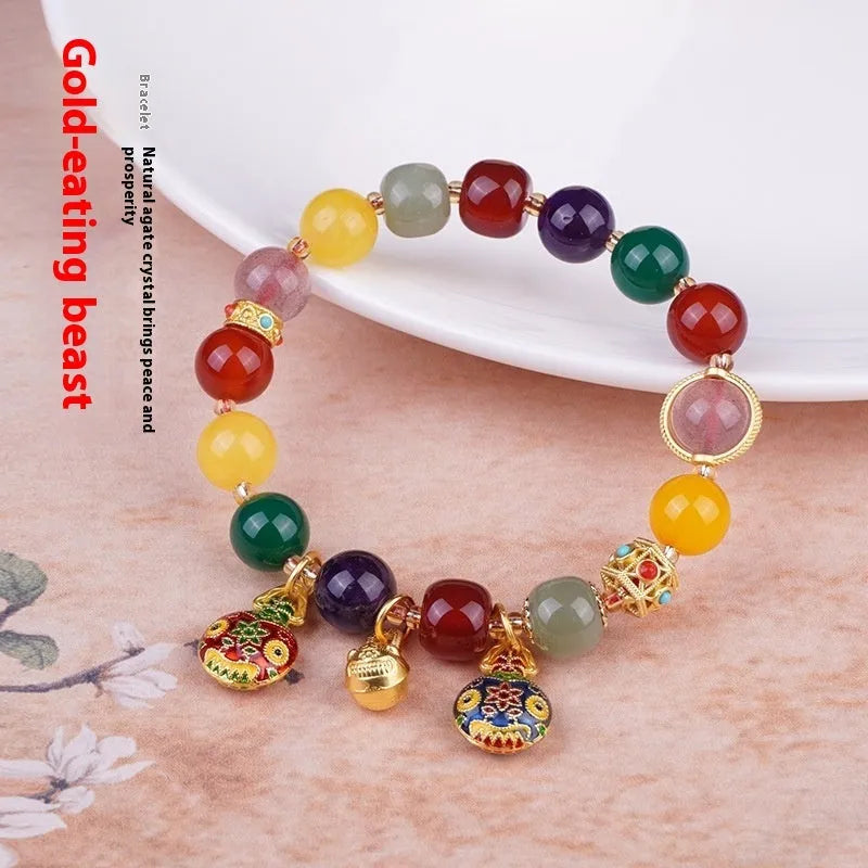 Hand-woven agate bracelet with gold and red Swallowing Gold Beast design on 10mm beads