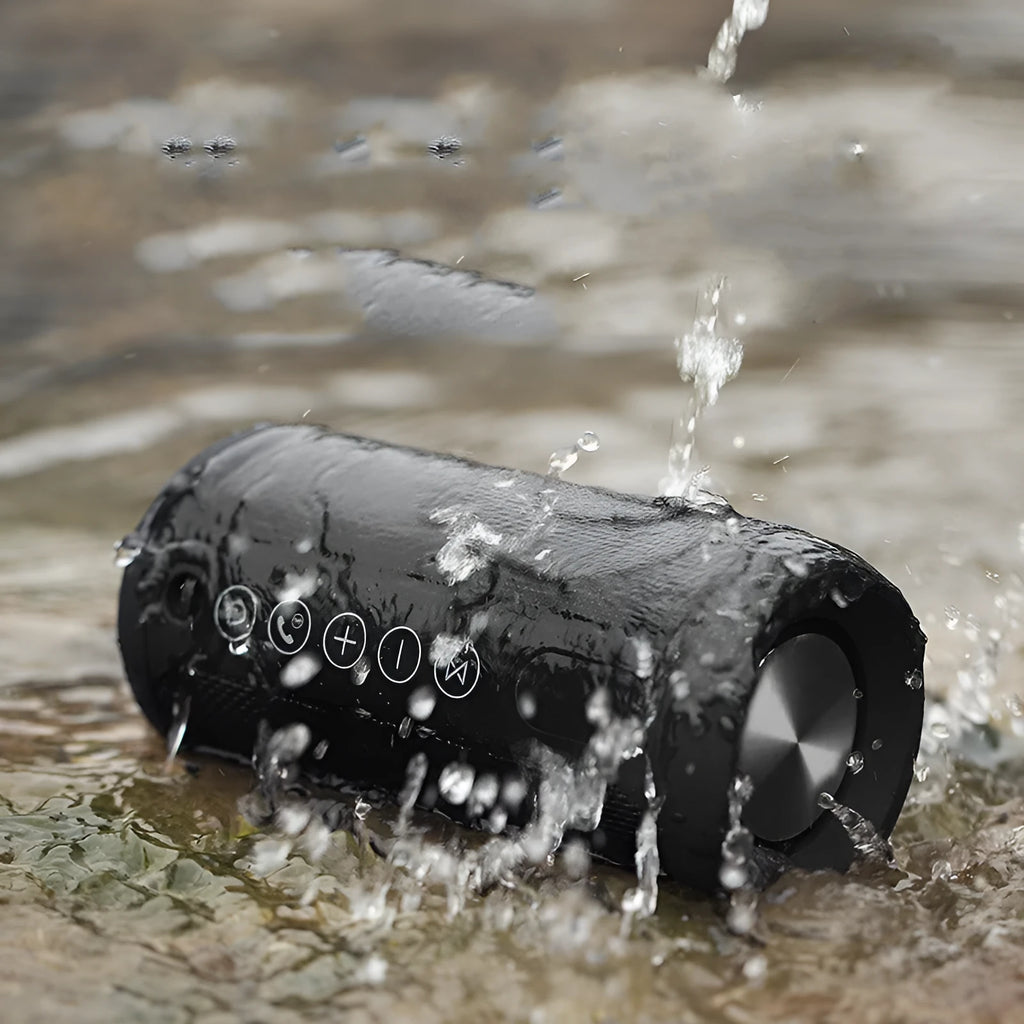 Waterproof portable outdoor Bluetooth speaker in black, camouflage, grey, or red colour.