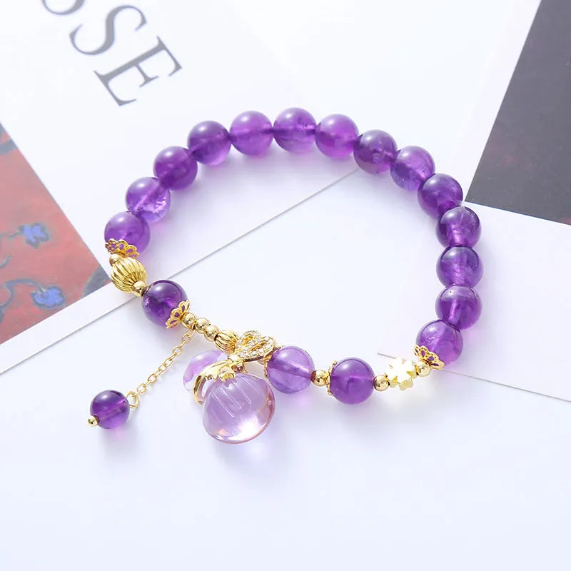 Purple amethyst bracelet with money bag pendant and adjustable cord