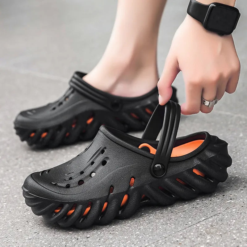 Men's beige EVA slipper sandals showing breathable hole design and textured non-slip sole.