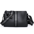 Black genuine leather one-shoulder crossbody bag showing 24cm width