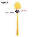 Yellow plastic Donald Trump novelty toilet brush with hanging handle, 40cm long