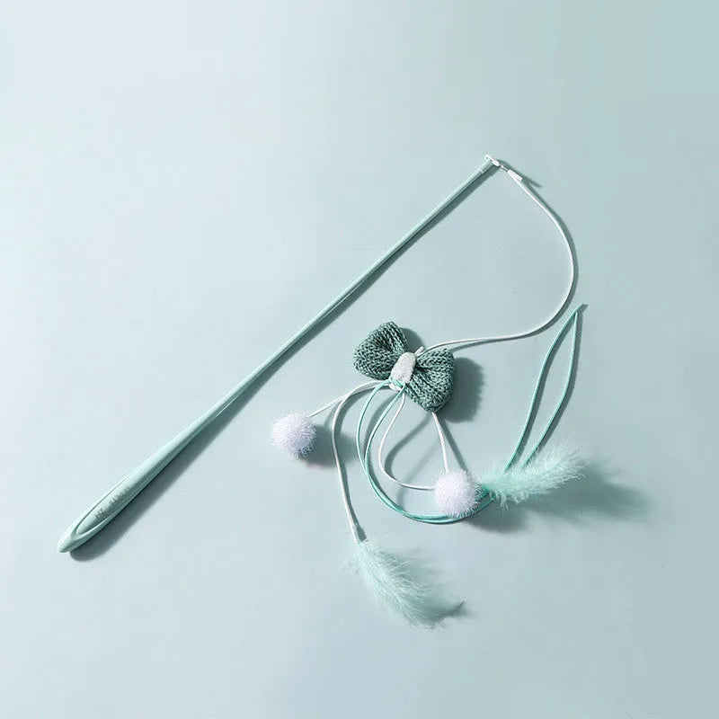 Blue and green cat teaser wands with feather attachments and long bite-resistant poles