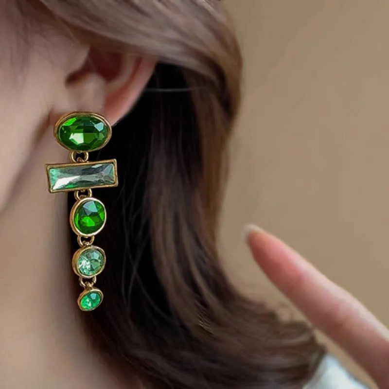 Pair of retro green gradient tassel earrings with geometric shape and inlaid zircon stones.