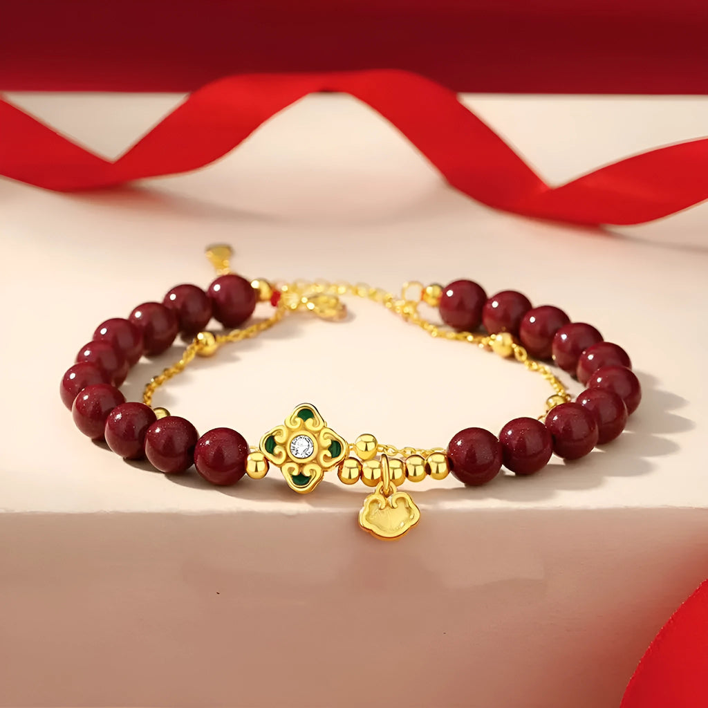 Sterling silver women's bracelet with geometric shape, Ruyi Xiangyun design, and cinnabar flower detail.