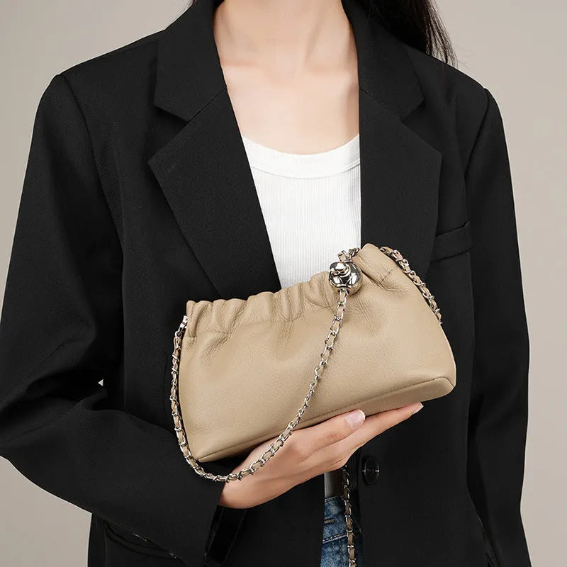 Women's soft leather dumpling-shaped crossbody bag in grey with a single strap