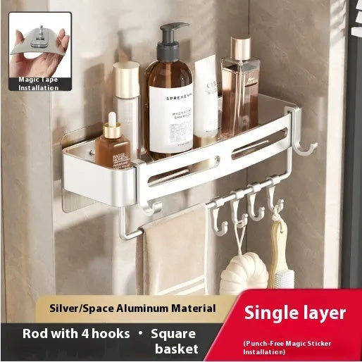 Gun grey metal triangle corner shelf mounted on a bathroom wall for shower storage.