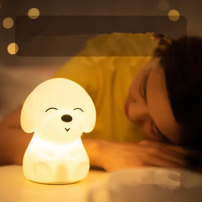 White LED puppy night light with silicone shade on a table in a corridor for soft glow
