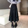 Corduroy A-line midi skirt with elastic waistband in milky white colour on hanger