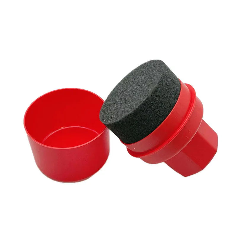 Hand-held black car tyre polishing sponge brush with a lid, showing its compact size and sponge head.