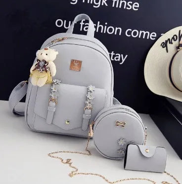 Three-piece PU leather backpack set for teenage girls in four colours with floral detailing