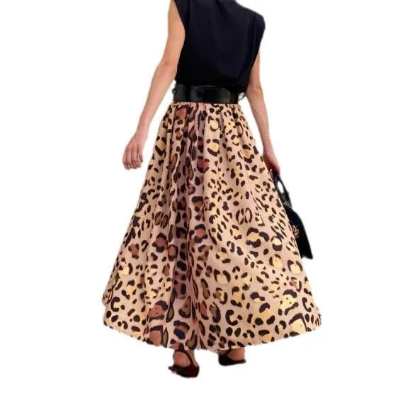 Brown leopard print women's long A-line skirt with a big hem, made from polyester fabric.