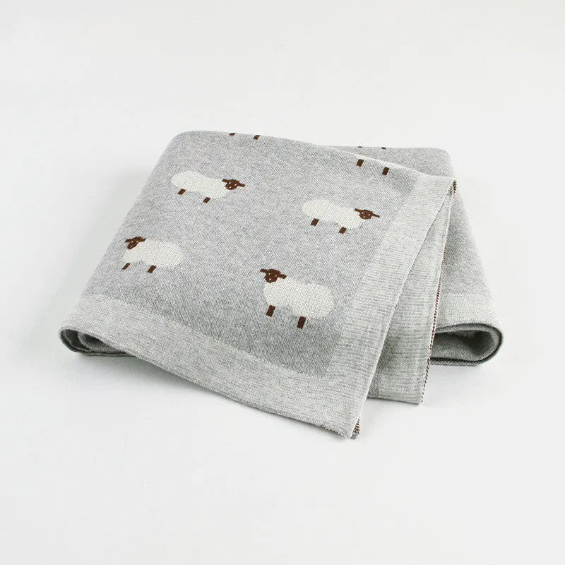 Pink and grey 100% cotton baby sheepskin blanket measuring 100x80cm for cots and prams.