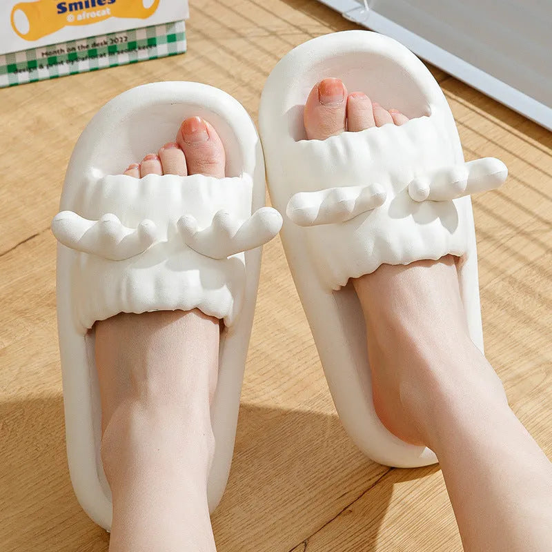 Women's EVA flip flop slippers with deer horn cut-out design in light yellow, showing non-slip sole.