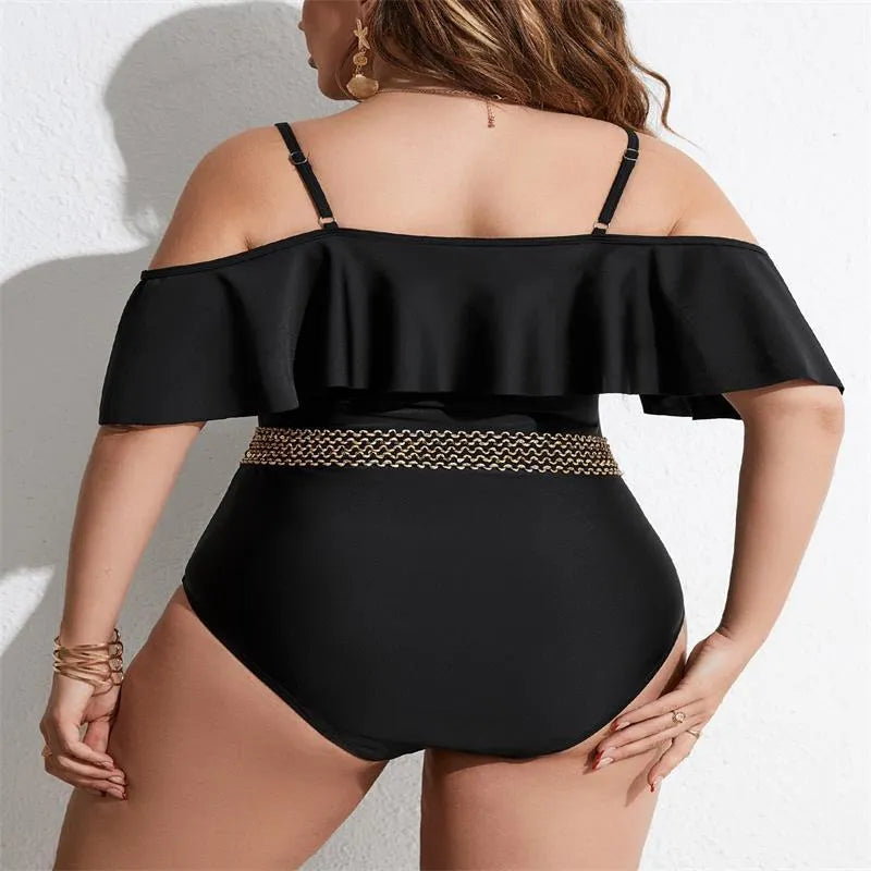 Black solid colour women's one-piece polyester swimsuit on a hanger.
