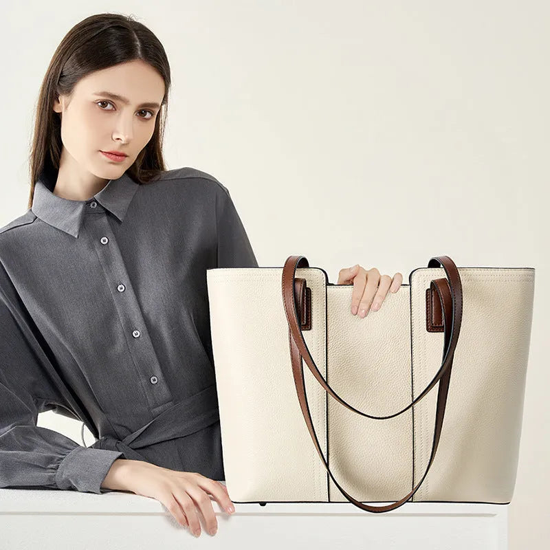 Women's black genuine leather crossbody bag with horizontal square shape and single shoulder strap