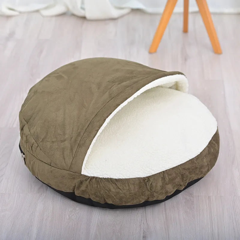 Brown cloth dog kennel with a removable cover for washing, shown in a home setting.