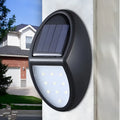 Black solar wall light with solar panel showing dimensions 75mm x 120mm