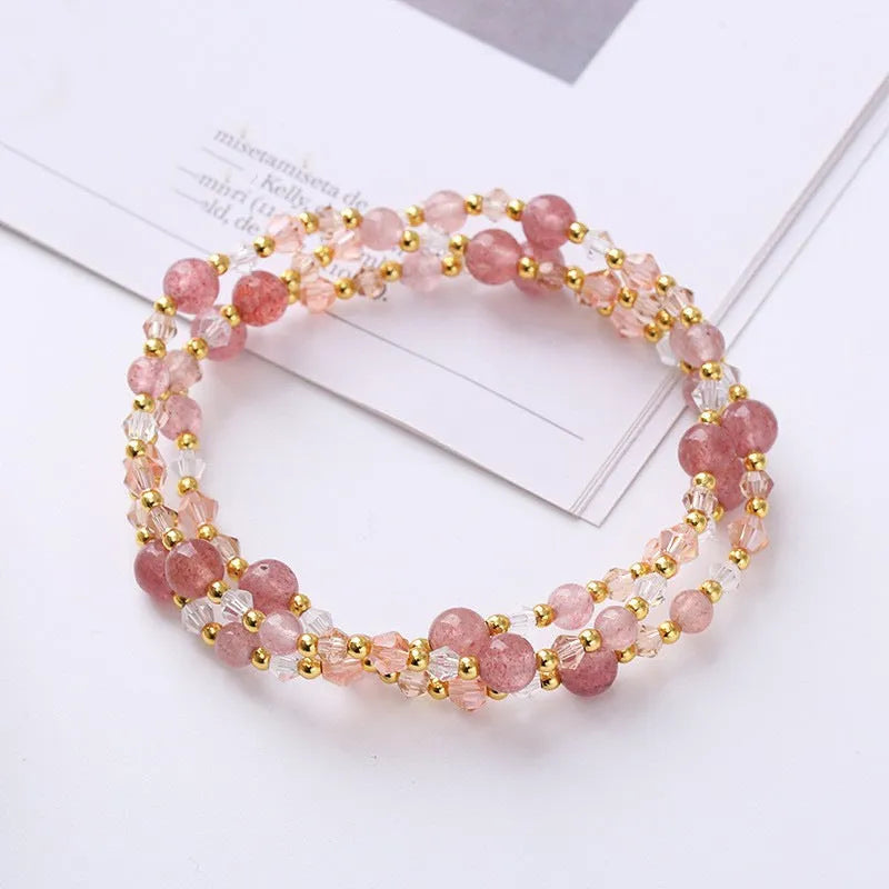 Women's adjustable three-ring bracelet with tourmaline, strawberry quartz and amethyst crystals on cord