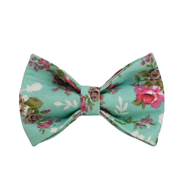 Rose print fabric dog collar set with green detachable bow, leash, and vest for pets