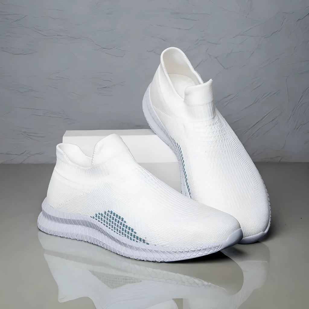Popcorn Flyknit fabric casual sneaker in low-top design with round toe available in white, black, and blue colours