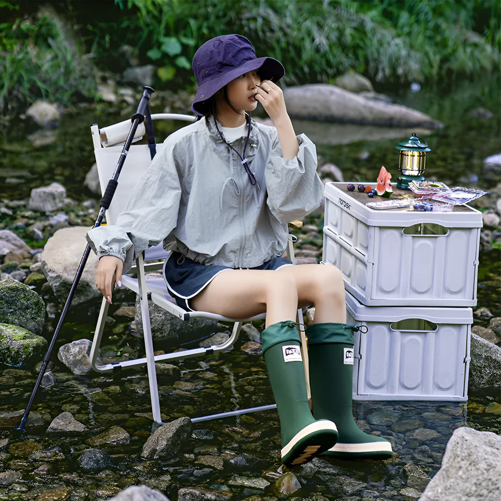 Pair of solid colour platform heel PVC wellington boots for men and women.
