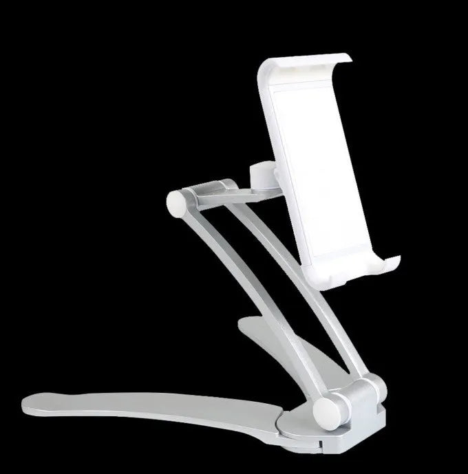 Silver aluminium alloy desktop tablet stand holding a tablet, showing 360-degree adjustable arm and mounting base.