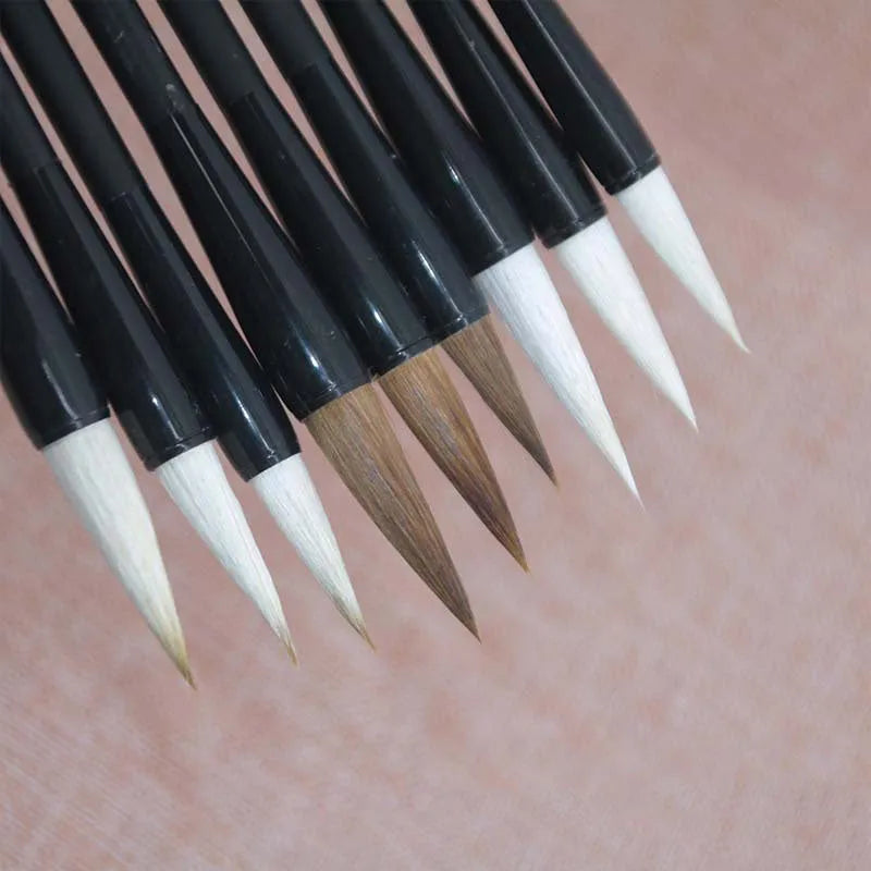 Traditional Chinese student writing brush with Jianhao nib on steel pipe barrel measuring 23cm length