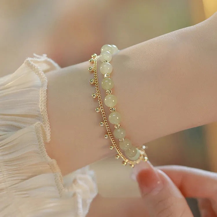 Natural Hetian jade bracelet with manual craft princess running bead design