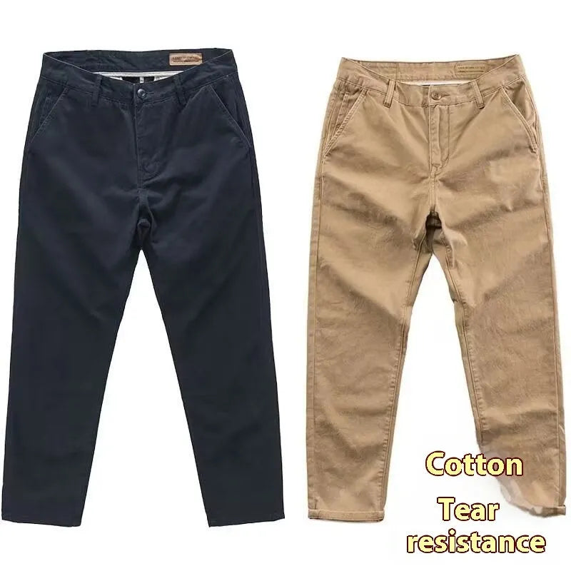 Man wearing slim-fit light straight-leg trousers in a micro-elastic washed fabric