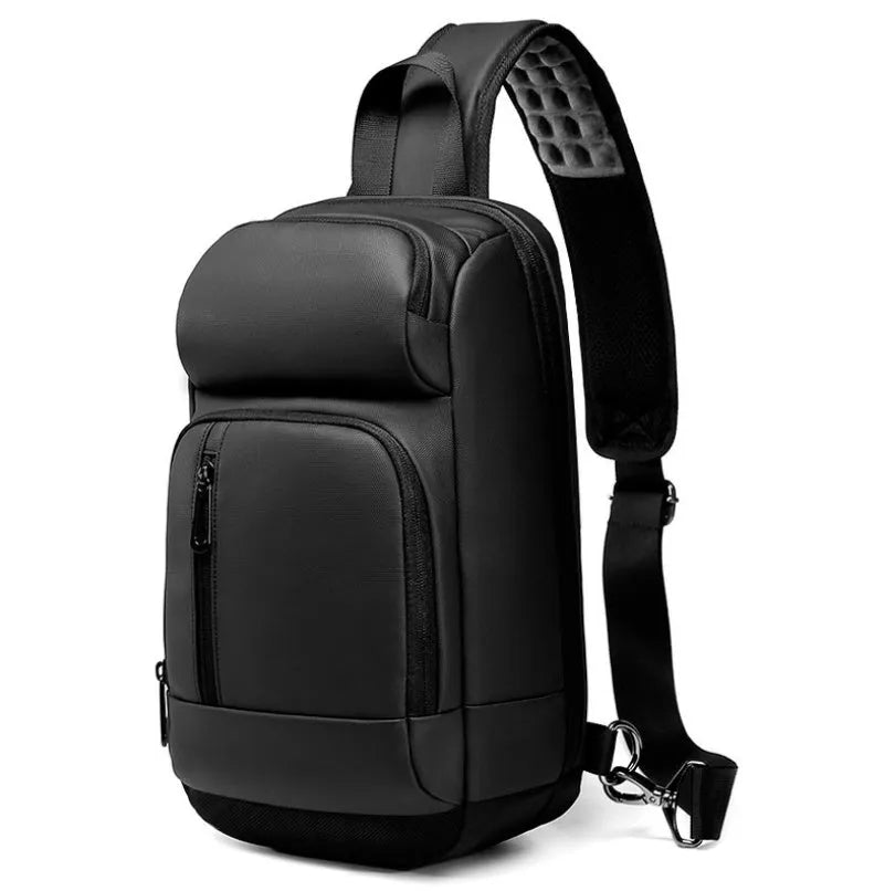 Black medium-sized PVC outdoor shoulder bag with an air cushion strap and internal organiser pockets.