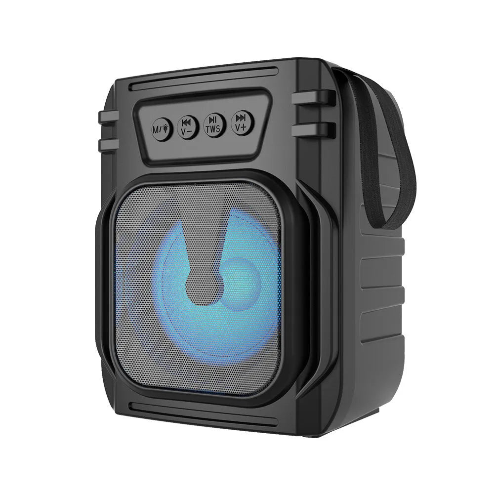 Portable Bluetooth speaker with compact design and USB charging cable
