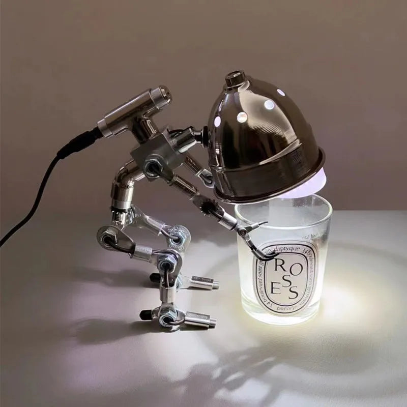 Silver or copper metallic robot-shaped desk lamp in 22cm or 29cm size with customisable graphics.