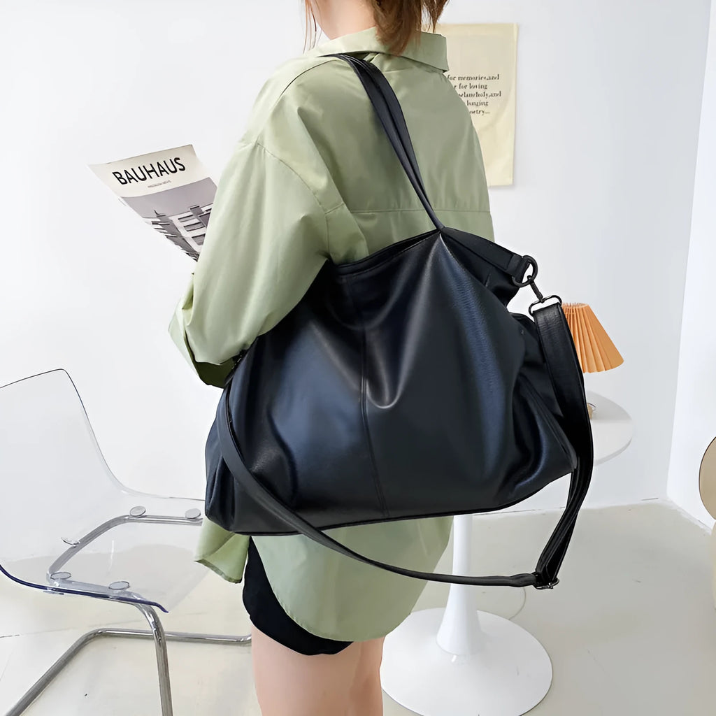 Large soft black PU messenger tote bag with shoulder strap and top zipper
