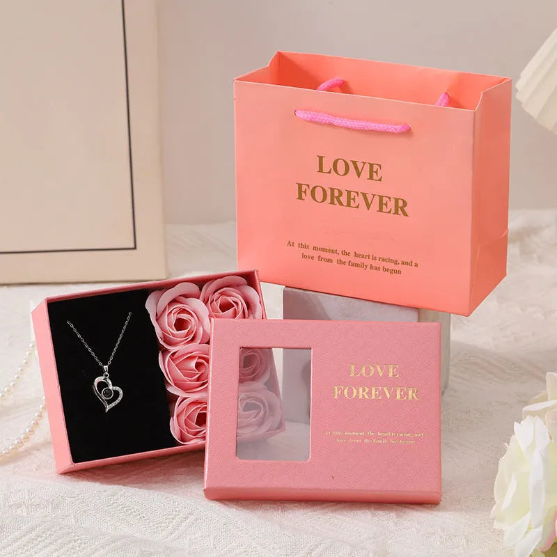 Korean style soap flower gift bouquet in presentation box with handbag in red, pink, or black.