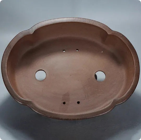 Classical rectangular purple clay bonsai pot for floor or tabletop use.