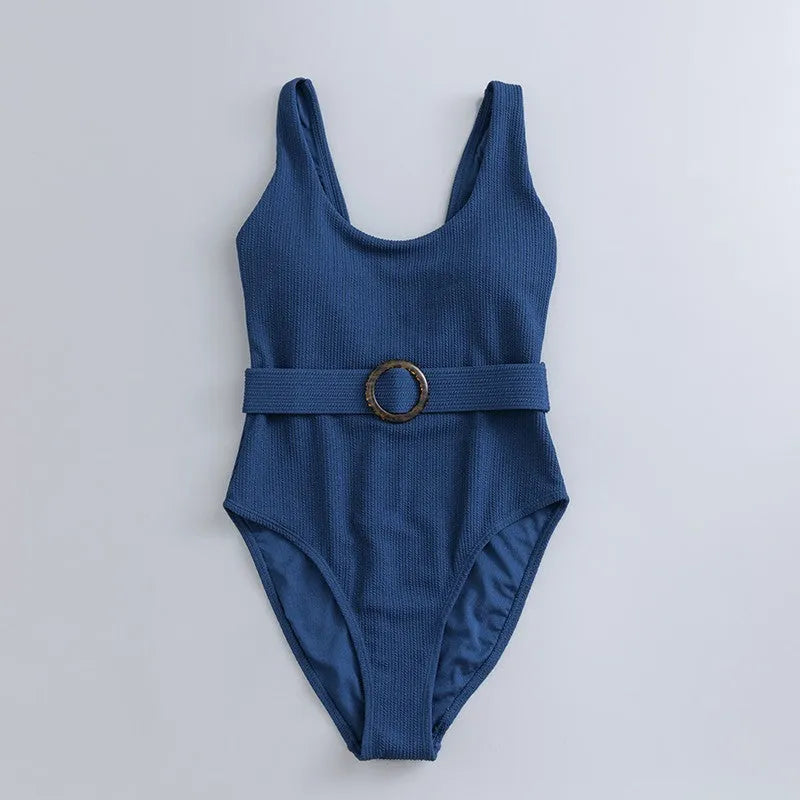 Navy blue women's one-piece swimsuit with triangle slimming design and removable chest pads