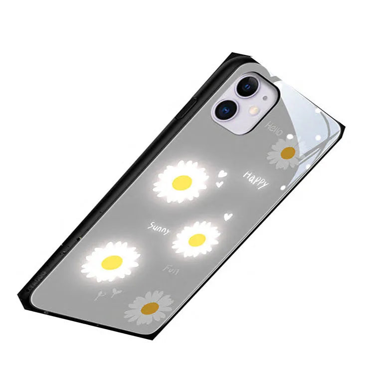Apple iPhone case with voice-activated colour light showing painted daisy floral design