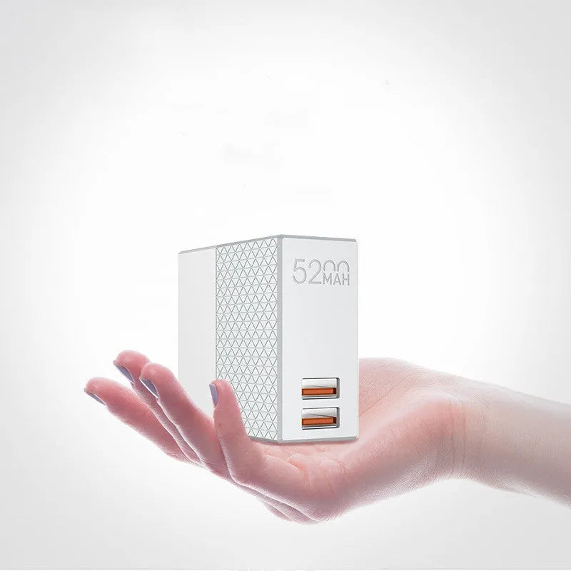 White two-in-one mobile power bank charger with built-in plug measuring 71.5mm