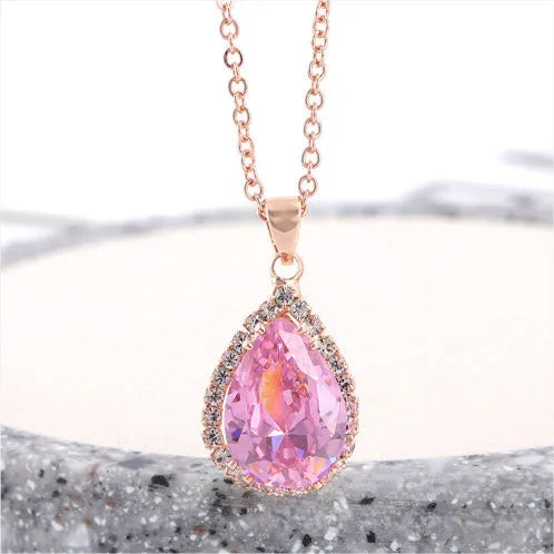 Rose gold water drop shaped women's necklace with geometric rhinestone decoration in pink colour