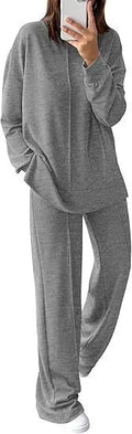 Women's army green polyester jogging suit set with long sleeves, shown as a matching top and trousers.