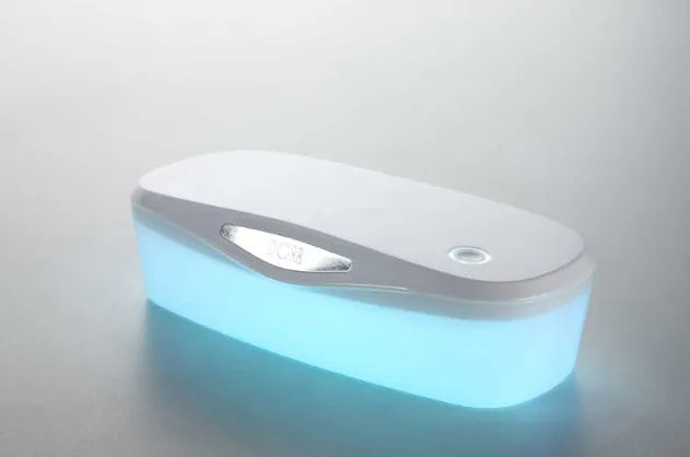 DORR portable UV sterilisation box with USB cable on a white background.