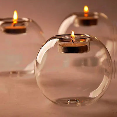 Clear handmade round glass bowl candle holder in three sizes: 10cm, 12cm, and 8cm diameter.